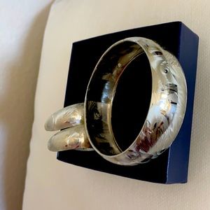 Silver tone bangle and matching earrings